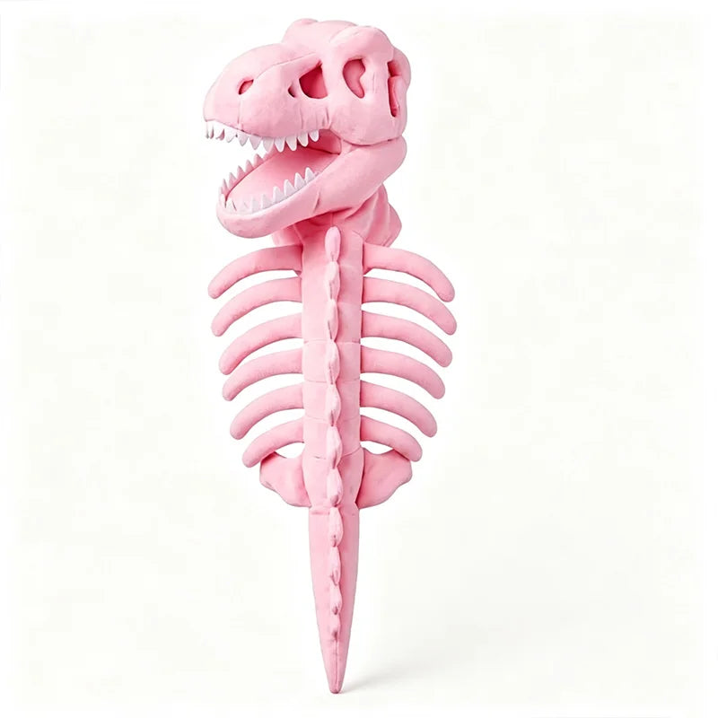 A pink plush dinosaur skeleton toy with an open mouth showing white teeth, photographed against a clean white background.