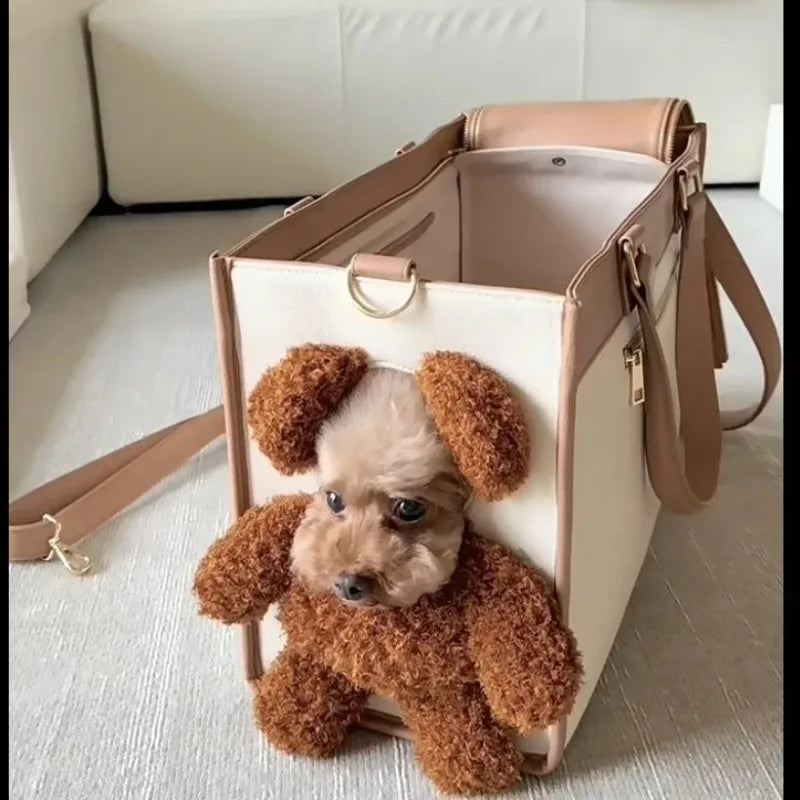 Small brown dog peeking out from a beige pet carrier with a white interior.