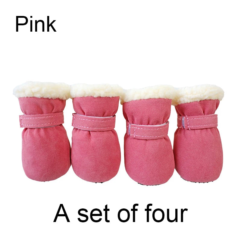Set of four pink pet boots with white fur trim on a white background