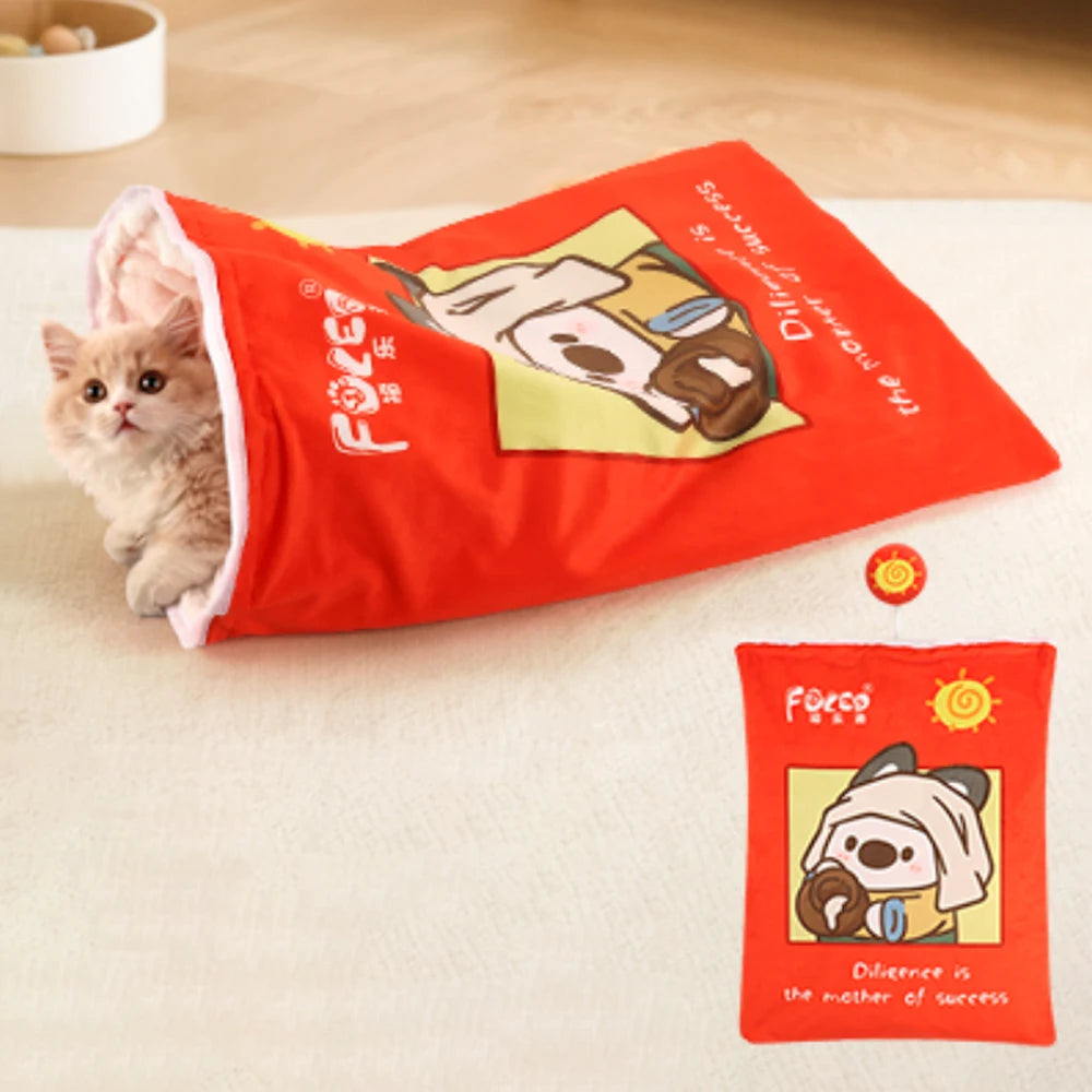 Cat peeking out from a red bag with cartoon dog design on a light surface.