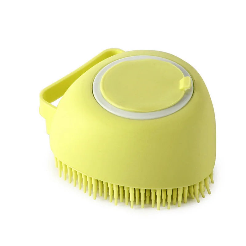 Yellow silicone scrubber with bristles on a white background