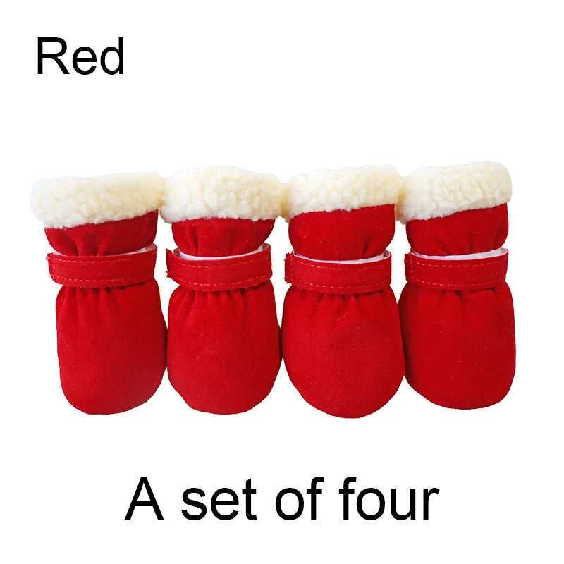 Set of four red pet boots with white fur on a white background