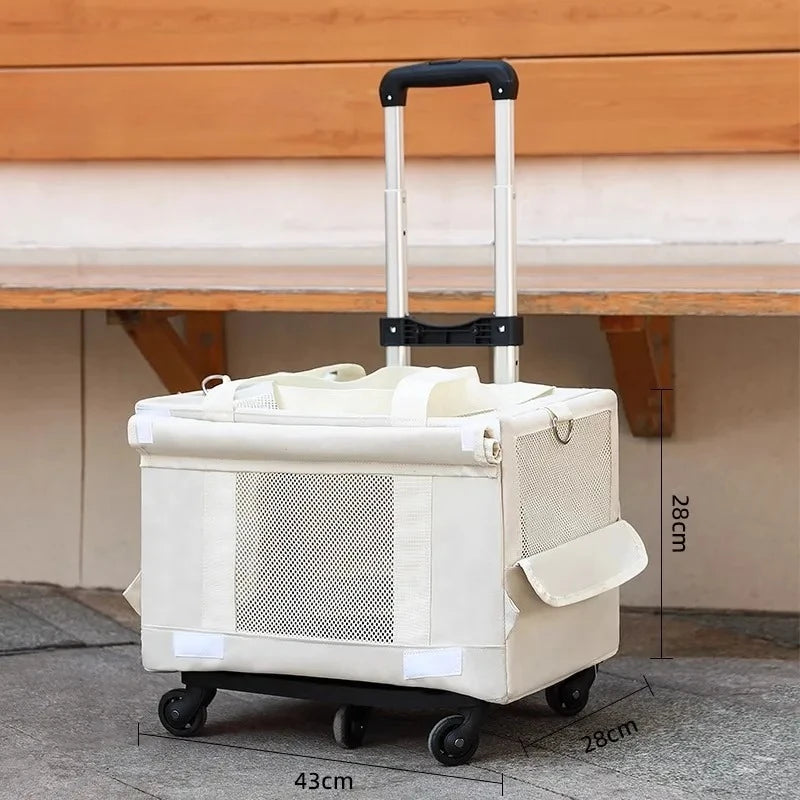 Beige pet carrier with wheels and handle on a wooden floor
