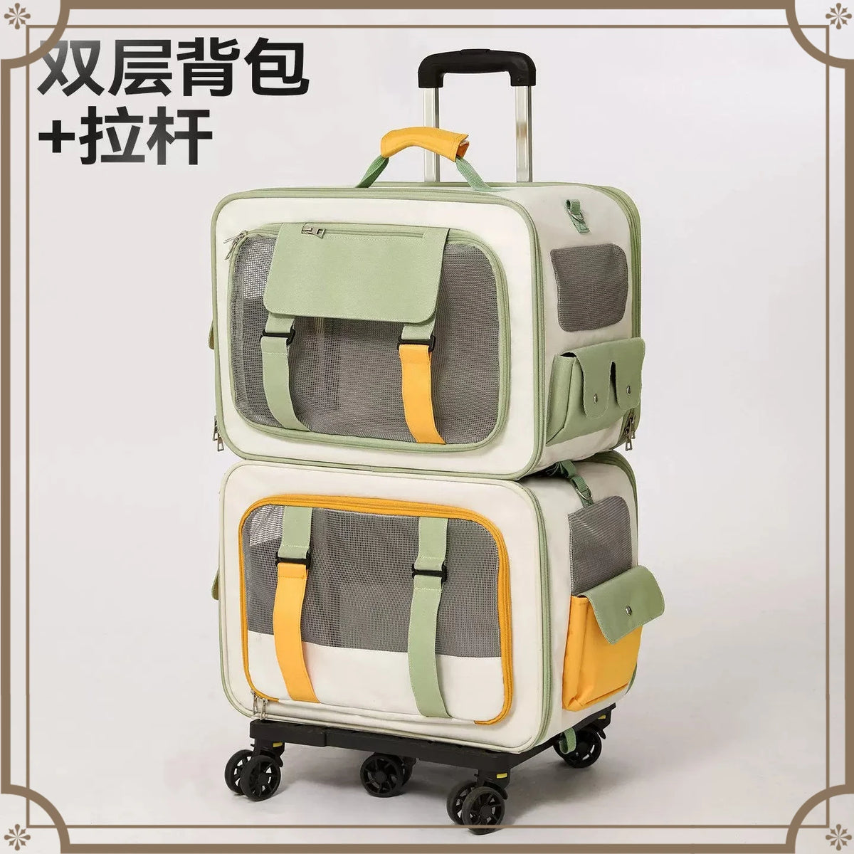 A two-tier pet carrier suitcase with an extendable telescoping handle and four wheels, featuring light green mesh windows, gray fabric panels, and yellow-orange trim. The image includes Chinese text in the top left corner reading '双层背包 + 拉杆' (Double-layer backpack + handle).