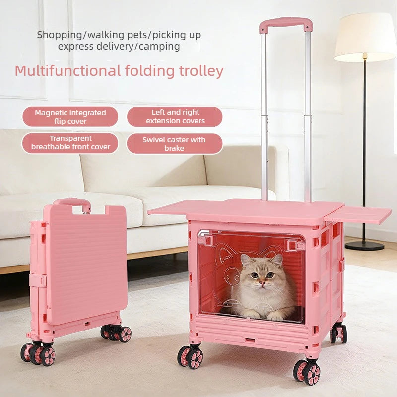 A pink folding trolley pet carrier with a cat inside, shown alongside its folded version in a bright living room. The trolley has a telescoping handle, wheels, a transparent front panel, and text callouts highlighting features like magnetic integrated flip cover and swivel caster with brake.