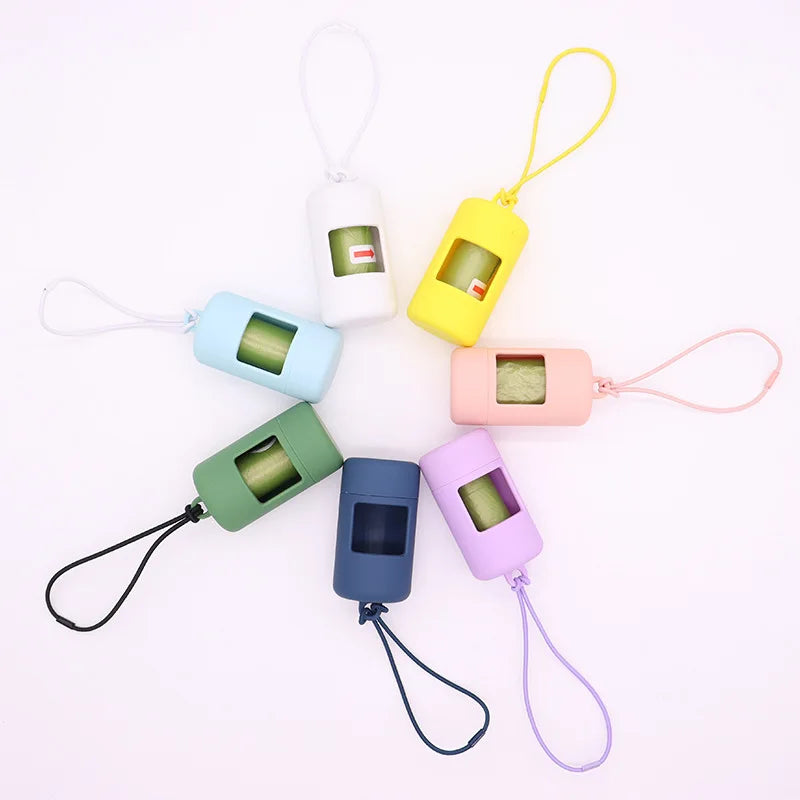 Set of colorful keychain pouches with small compartments on a white background