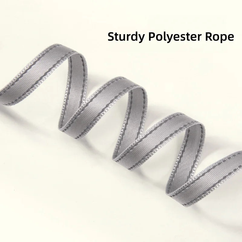 A coiled length of gray polyester rope with a ribbed texture and stitched edges, shown on a plain off-white background with the text 'Sturdy Polyester Rope' in the upper right.