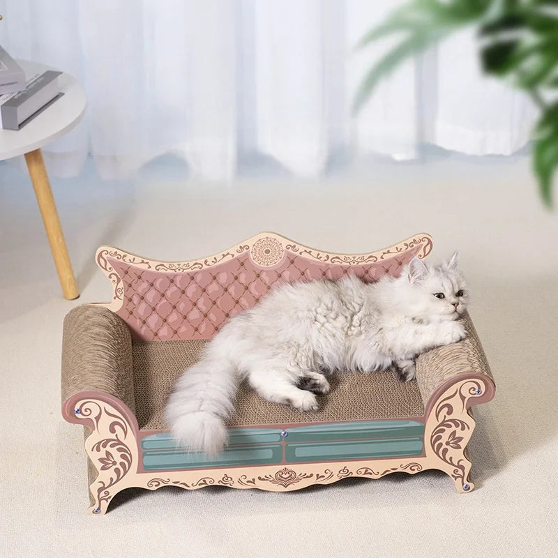 Cat lounging on a decorative cat bed with pink cushion and ornate design.