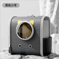 Gray pet carrier with cat ears and a transparent window, featuring the brand 'Pet Planet'.