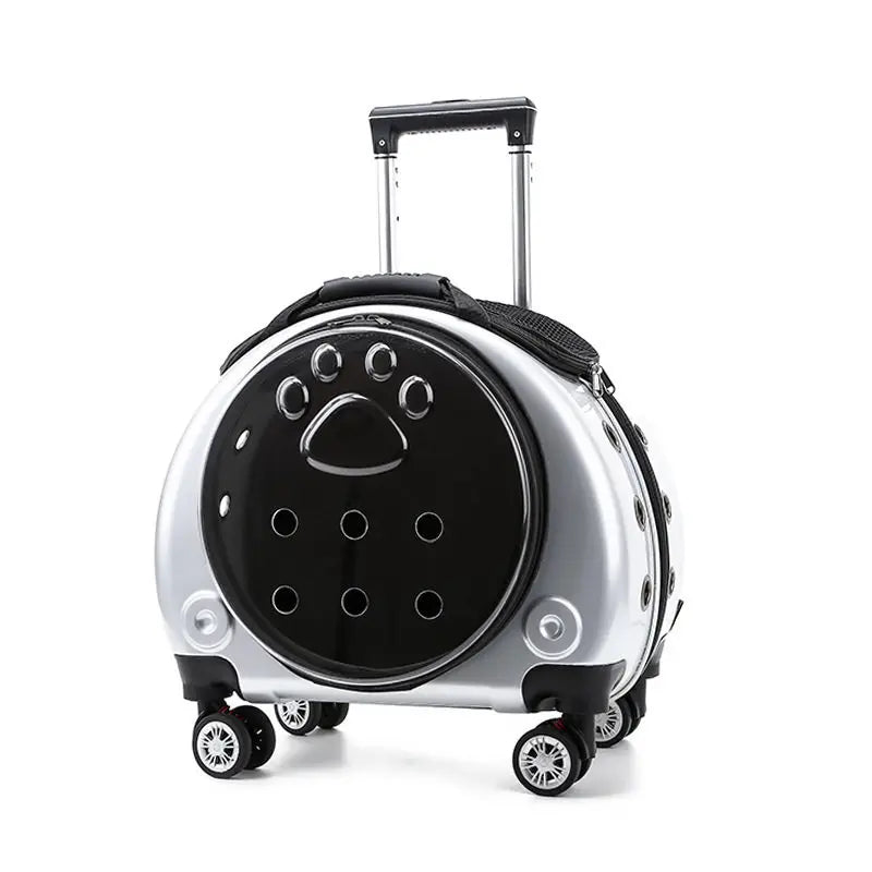 Silver and black suitcase with circular design on a white background