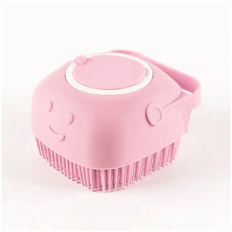 Pink silicone scrubber with a smiley face on a white background