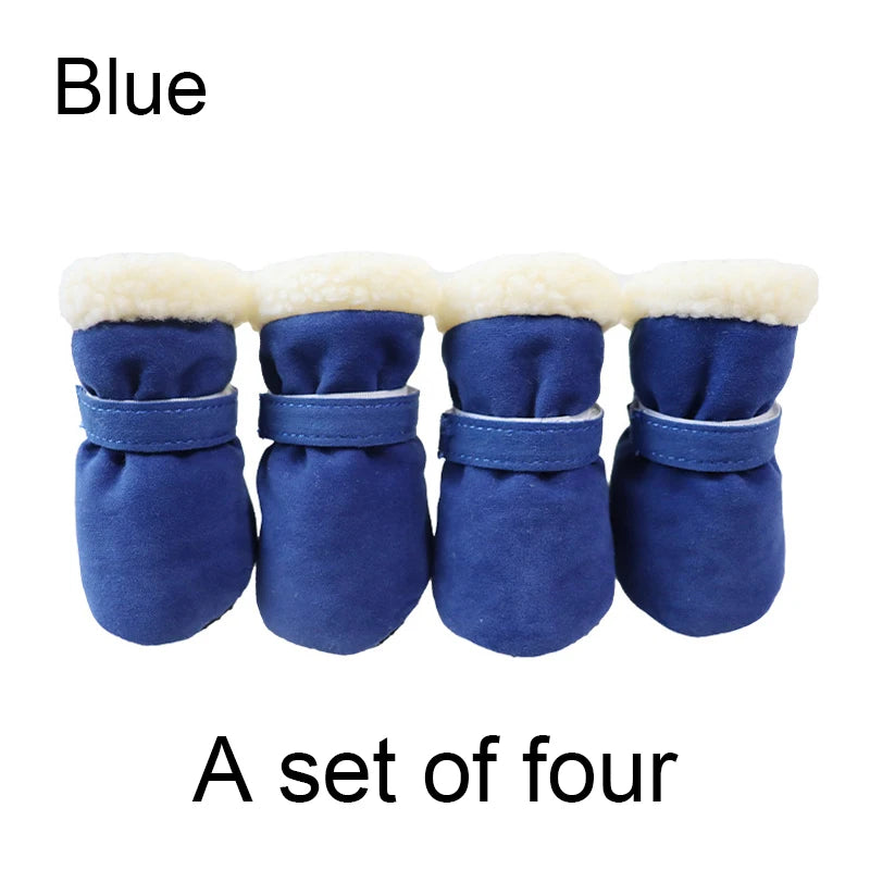 Set of four blue pet boots with white fur lining on a white background