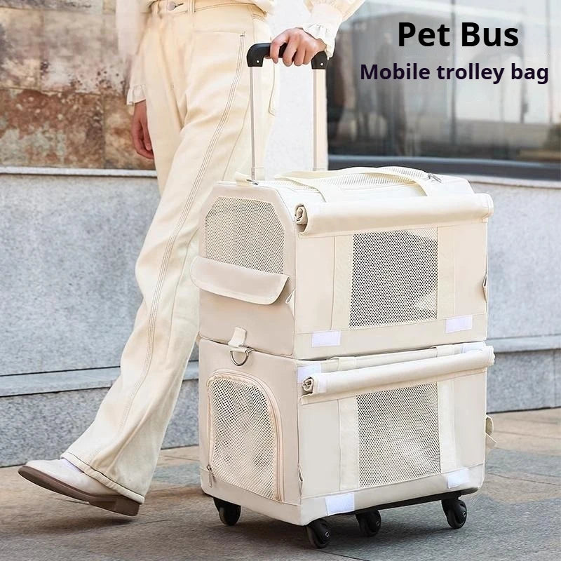 Person holding a beige pet bus mobile trolley bag on wheels.