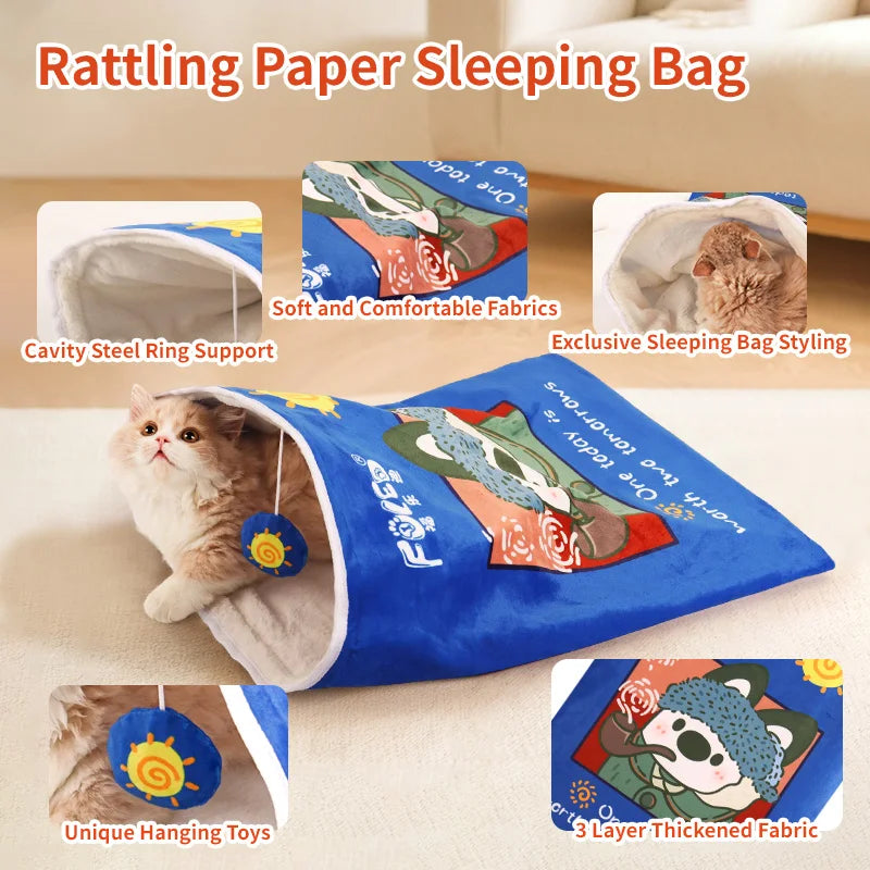 Cat playing with a blue rattling paper sleeping bag on a beige surface.