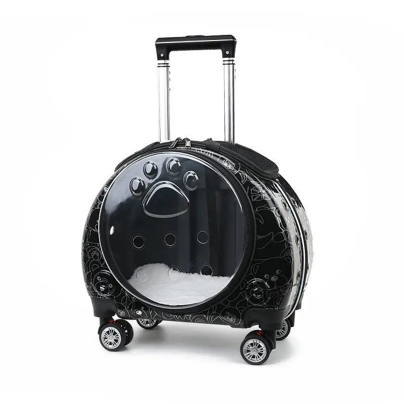 Black round suitcase with paw print design on a white background