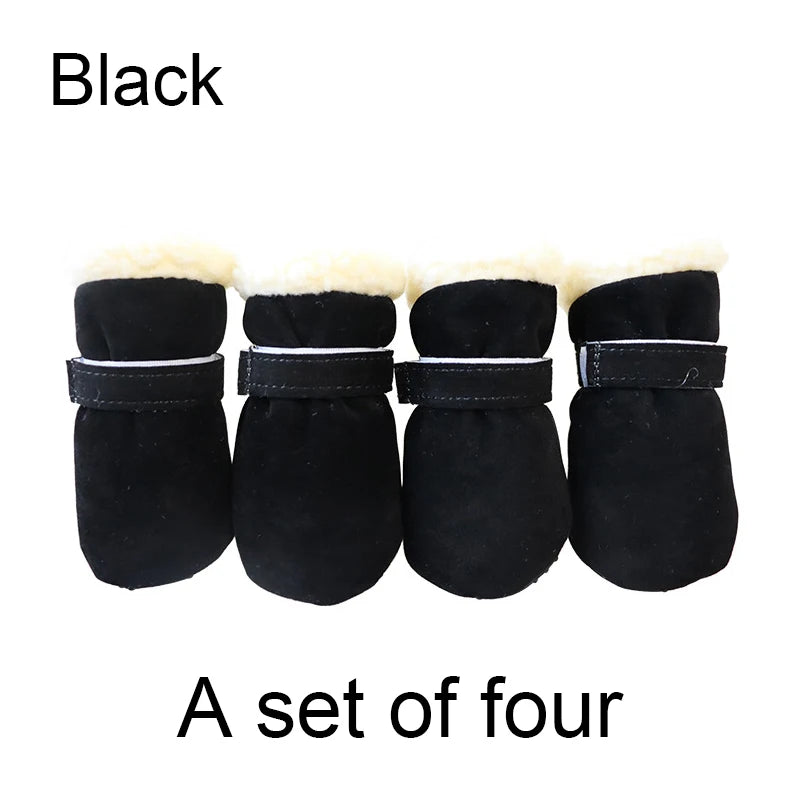 Set of four black pet boots with white fur lining on a white background