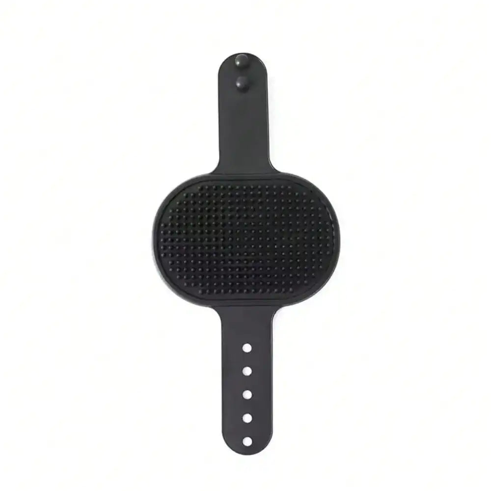 A black silicone pet grooming brush with a textured bristle pad and adjustable handle, shown against a plain white background.