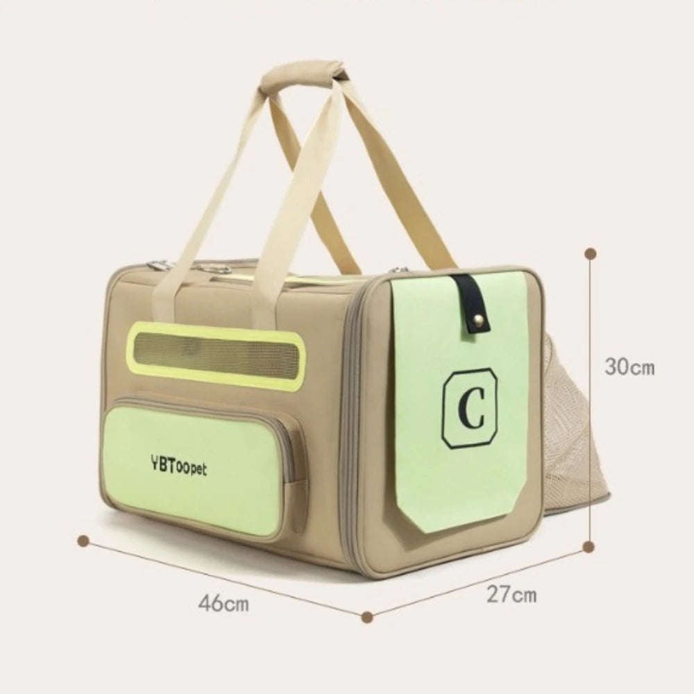 A beige and light green pet carrier bag with dimensions labeled as 46cm x 27cm x 30cm, featuring dual top handles, a front zippered pocket, and a side mesh window.