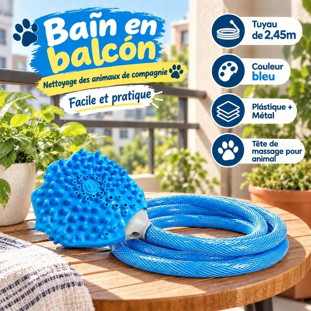 Blue pet bathing hose and scrubber set displayed on a wooden balcony table with plants in the background. The image includes French promotional text and feature icons indicating a 2.