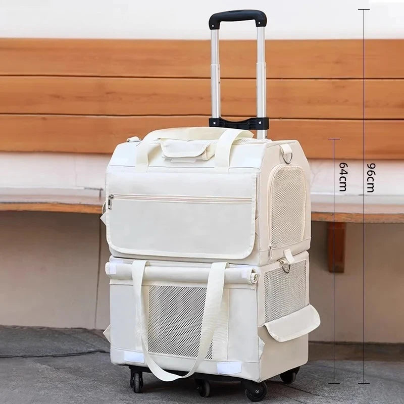 Stack of two white suitcases with wheels on a wooden bench background